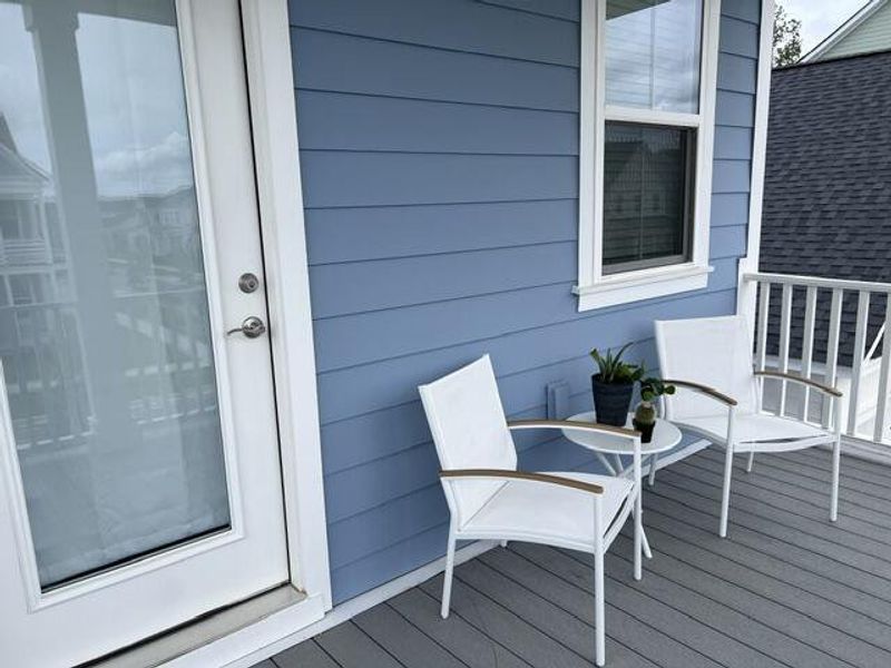 Exterior details and patio area of a home in Midtown at Nexton, Summerville (Image 4). Exterior details and patio area of a home in Midtown at Nexton, Summerville (Image 4).