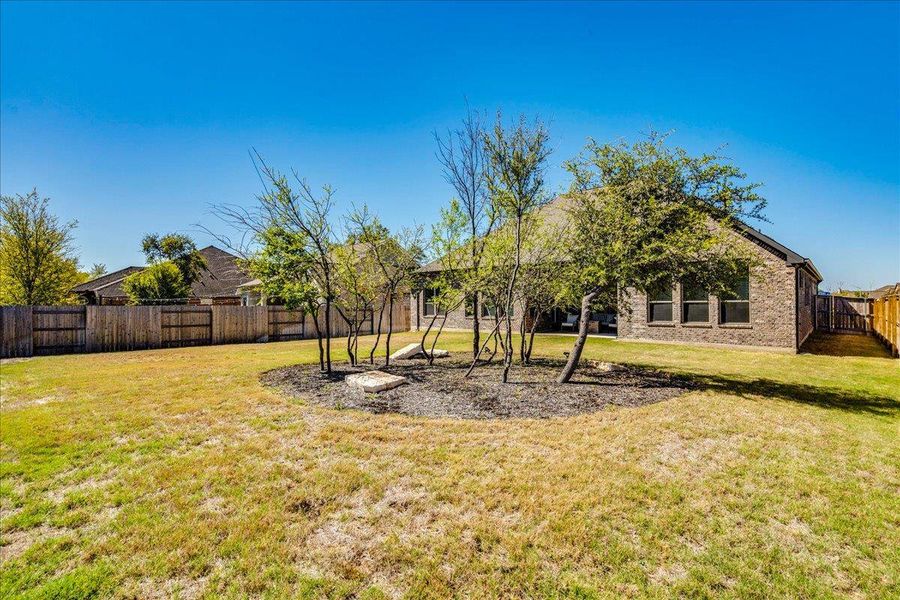 Fenced backyard featuring a patio Fenced backyard featuring a patio