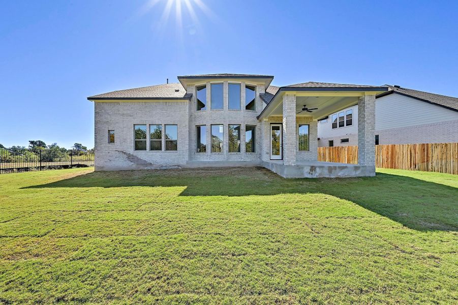 Exterior details and patio area of a home in Santa Rita Ranch - 60', Liberty Hill (Image 3).