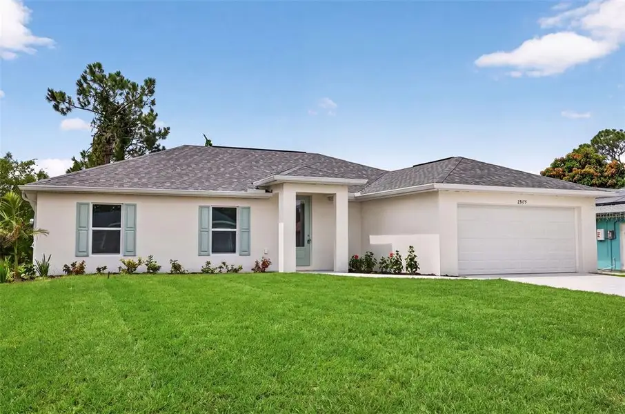 Front exterior of a new home in , Port Charlotte, FL, highlighting curb appeal (Image 2). Front exterior of a new home in , Port Charlotte, FL, highlighting curb appeal (Image 2).