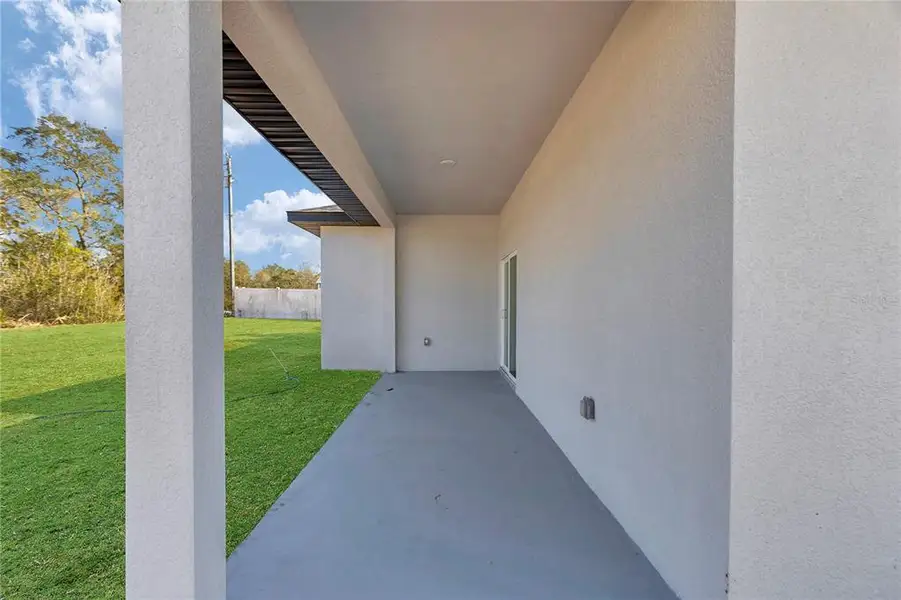 Exterior details and patio area of a home in , Ocala (Image 3). Exterior details and patio area of a home in , Ocala (Image 3).