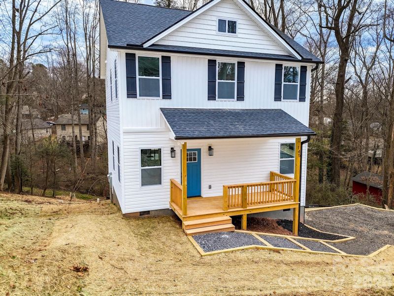 Exterior details and patio area of a home in , Asheville (Image 27).