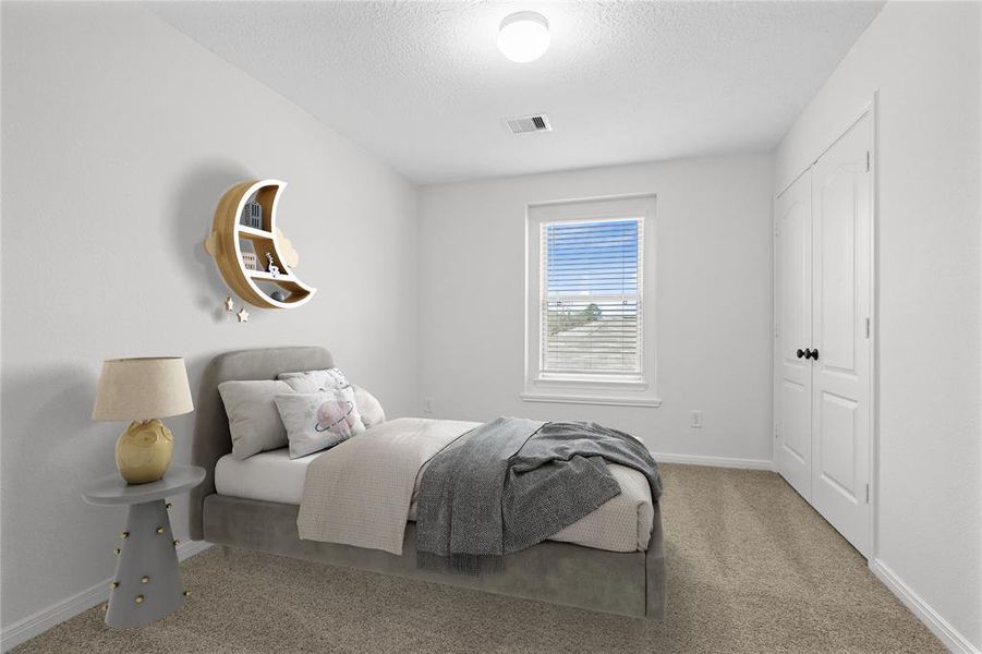 Secondary bedroom features plush carpet, neutral paint, lighting, window with privacy blinds and ample sized closet space.