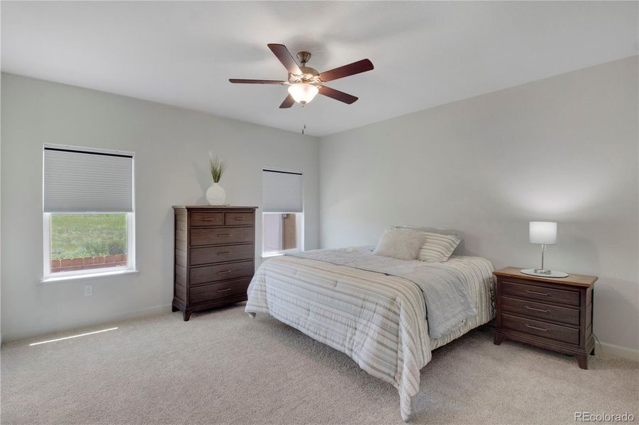 Dining room featuring light wood-style floors, crown molding, and a chandelier