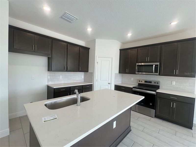 Furnished interior view inside a new home in Hills of Minneola, Minneola (Image 10).