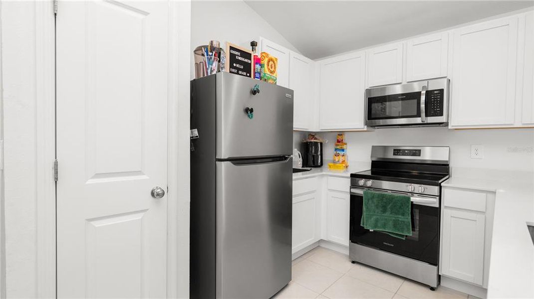 Furnished interior view inside a new home in Peace Creek Reserve: Legacy Collection, Winter Haven (Image 18).