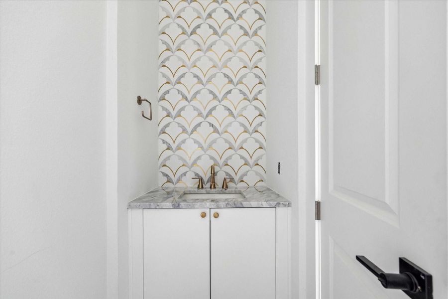 This beautifully appointed powder bath is conveniently located on the second floor, near the main living spaces.