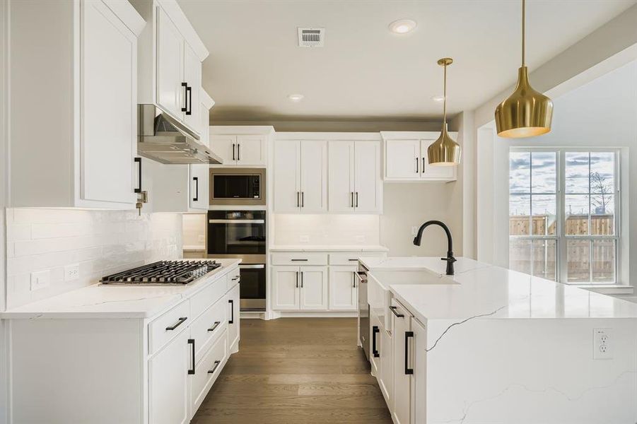Furnished interior view inside a new home in Wildridge, Oak Point (Image 6).