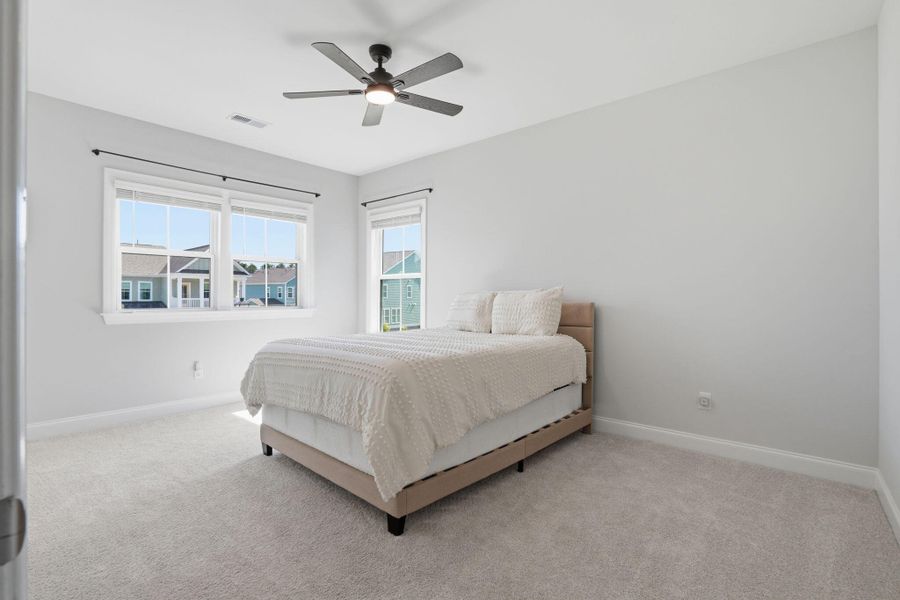 Furnished interior view inside a new home in Tidewater at Lakes of Cane Bay, Summerville (Image 18).
