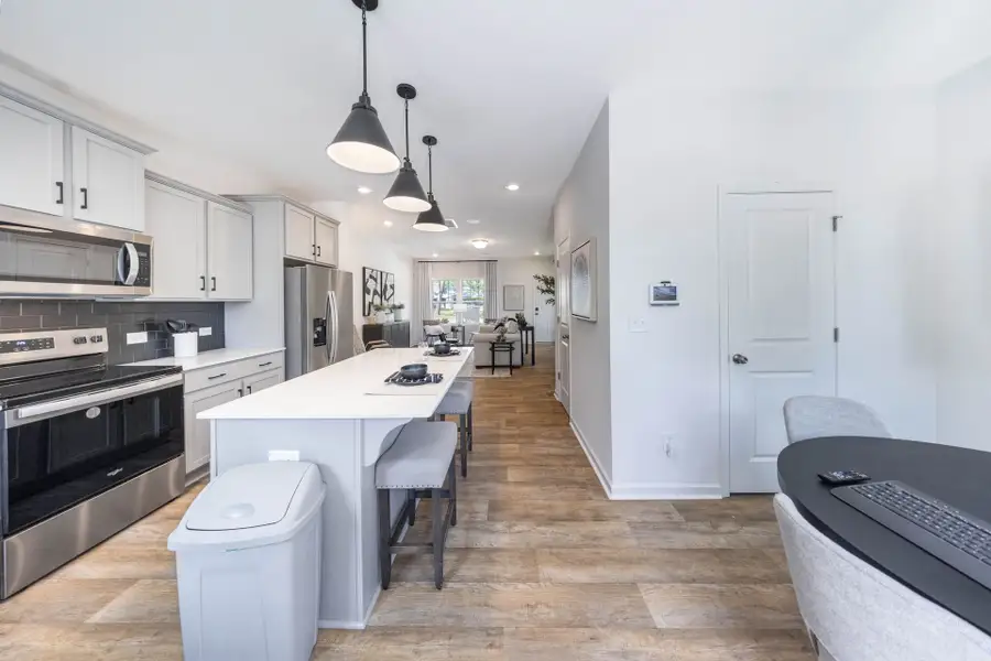 Furnished interior view inside a new home in Dukes Ridge, Charlotte (Image 2).