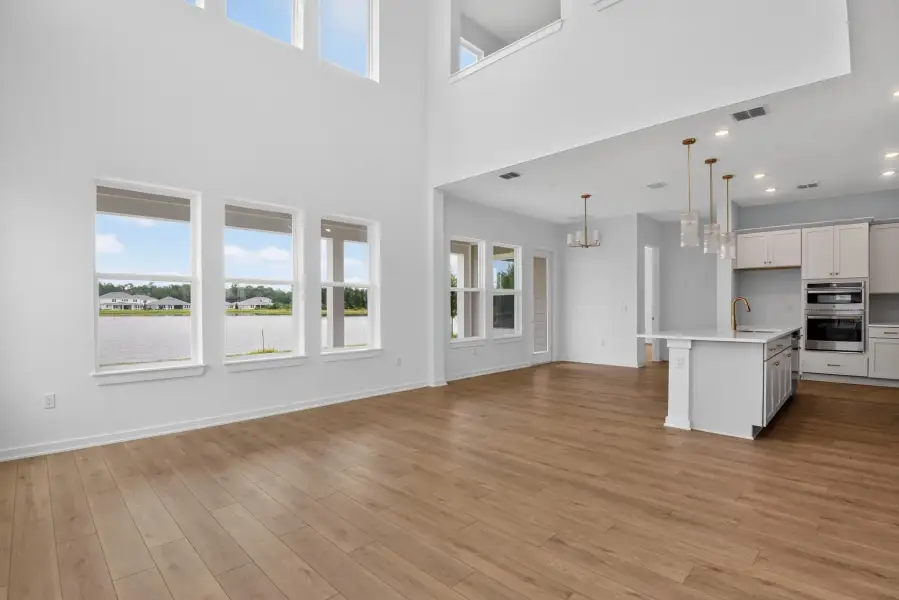 Spacious, unfurnished interior of a new home in Ardisia Park, New Smyrna Beach (Image 13).