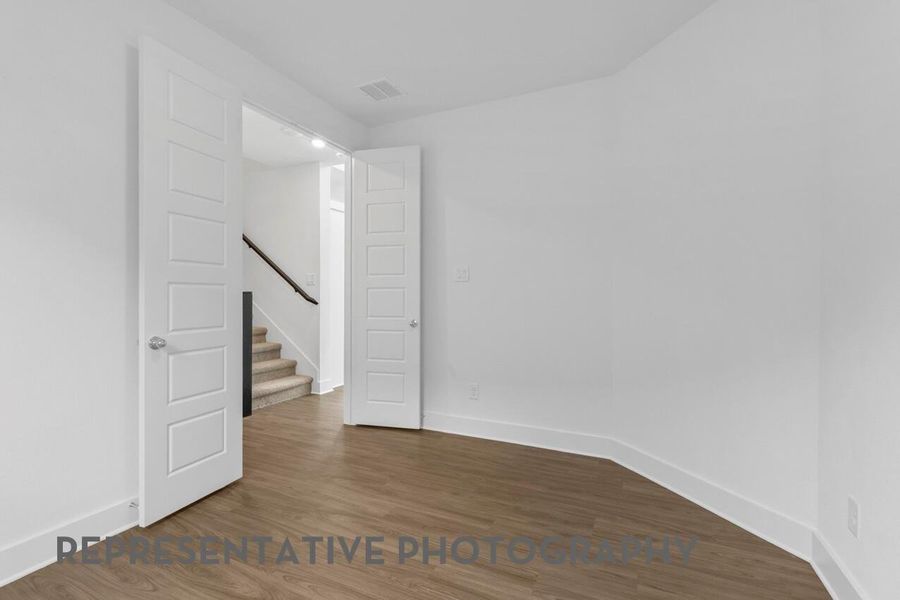 The spacious study offers a quiet, comfortable environment ideal for both focused work and relaxing downtime.