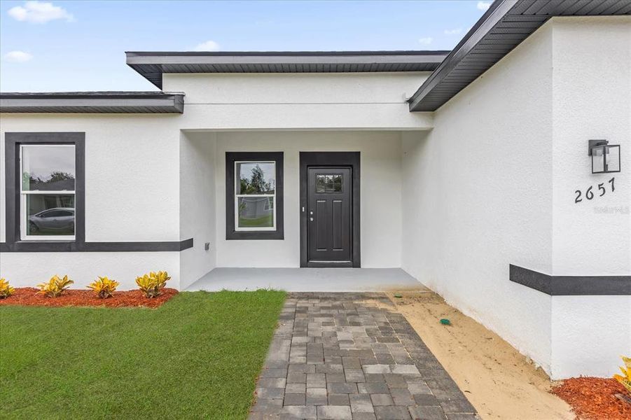 Exterior details and patio area of a home in , Ocala (Image 4).