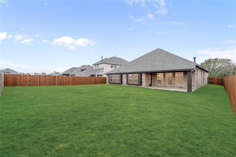 Exterior details and patio area of a home in The Oaks, Red Oak (Image 20). Exterior details and patio area of a home in The Oaks, Red Oak (Image 20).