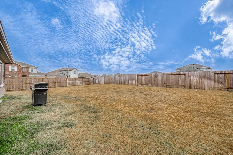 Exterior details and patio area of a home in Mill Creek, Magnolia (Image 23).