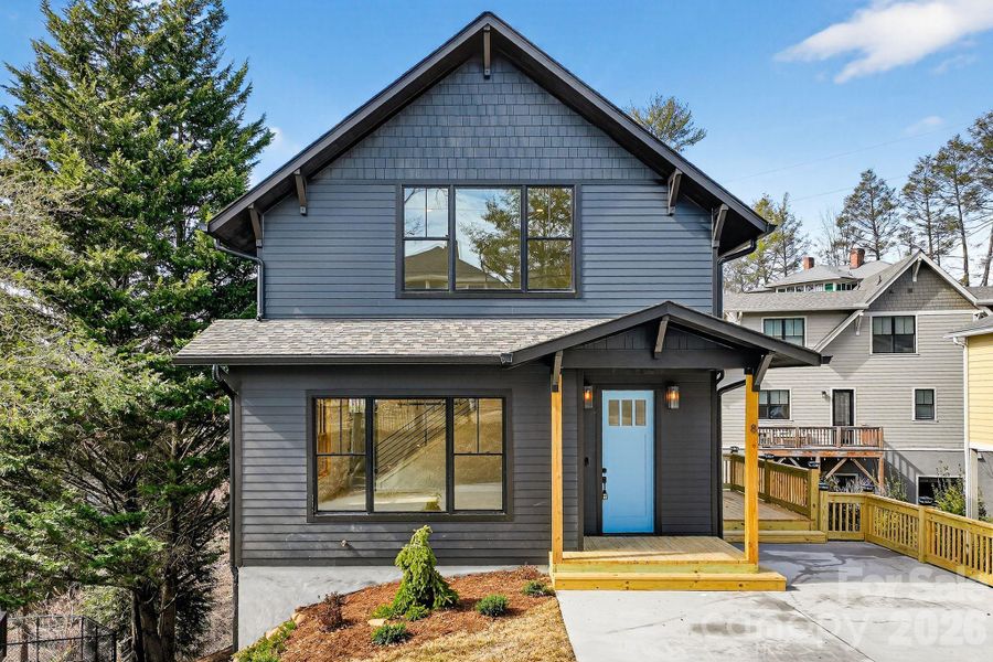 Front exterior of a new home in , Asheville, NC, highlighting curb appeal (Image 24).