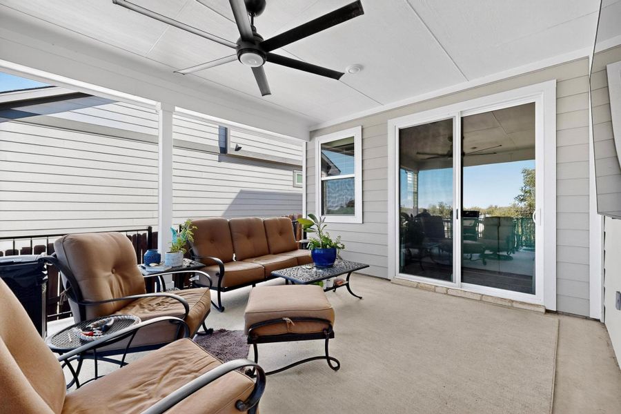 View of patio / terrace featuring an outdoor living space and a ceiling fan