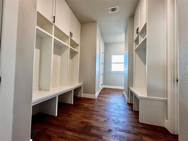 Mudroom featuring dark hardwood / wood-style floors