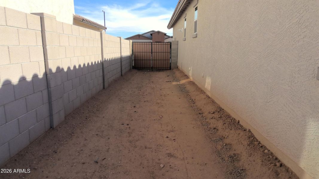 10ft side yard with double gate!