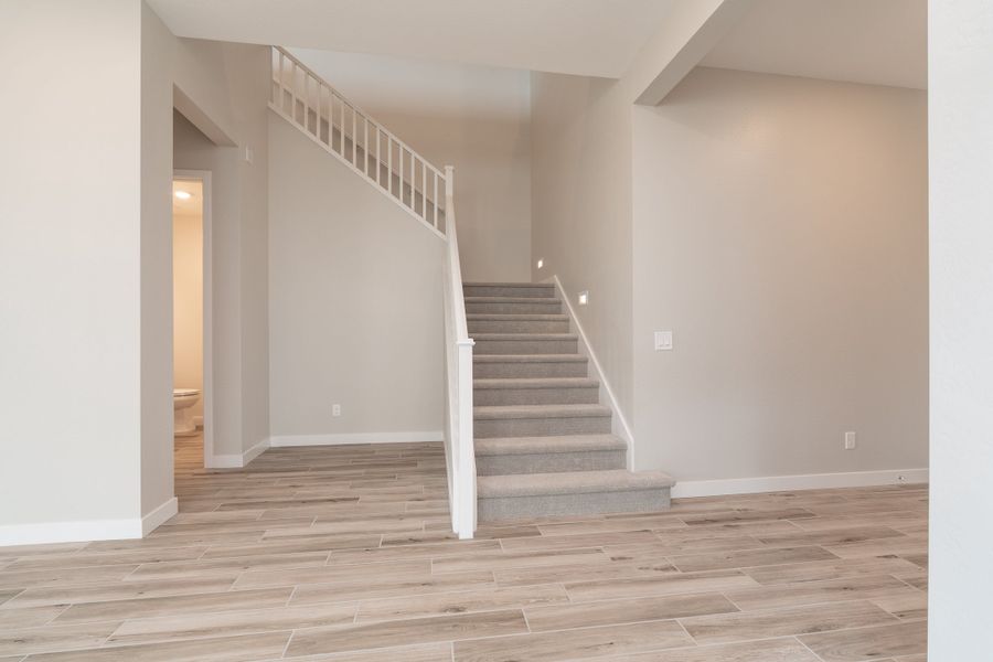Spacious, unfurnished interior of a new home in Waterston Central, Gilbert (Image 14).