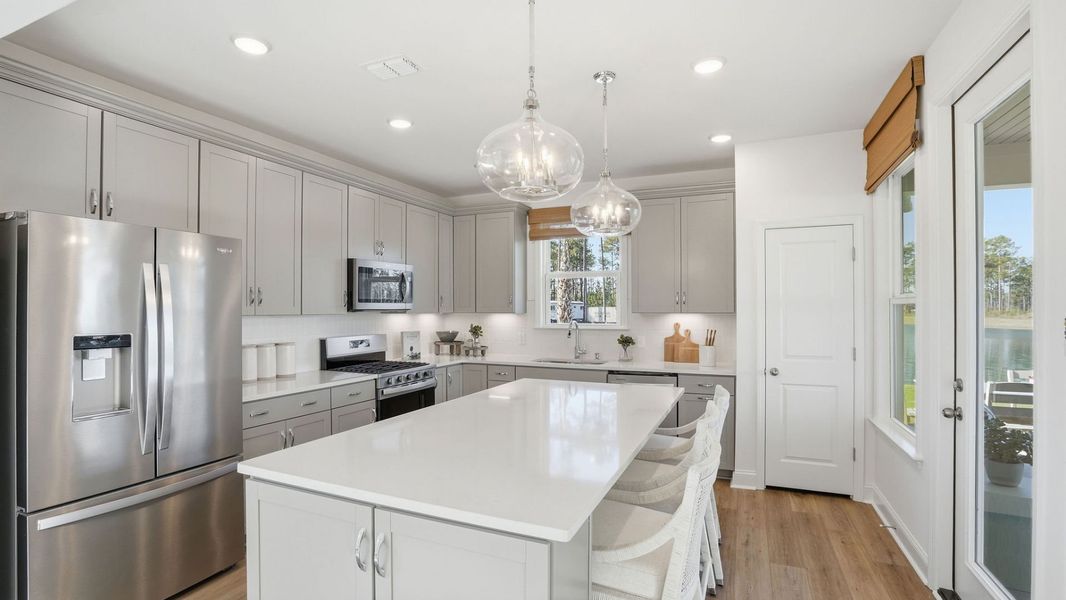 Representative furnished interior of a home built from the Compass by Del Webb in Del Webb Point Hope, Charleston (Image 12).