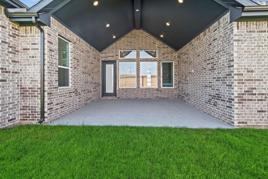 Exterior details and patio area of a home in Elyson 60's, Katy (Image 3). Exterior details and patio area of a home in Elyson 60's, Katy (Image 3).