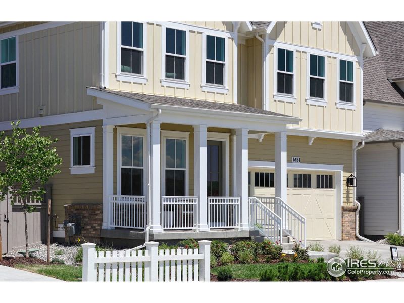 Exterior details and patio area of a home in Westerly, Erie (Image 2). Exterior details and patio area of a home in Westerly, Erie (Image 2).