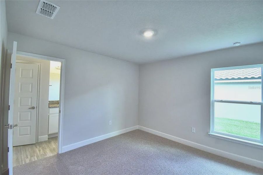 Spacious, unfurnished interior of a new home in Lake Juliana Estates, Auburndale (Image 25).
