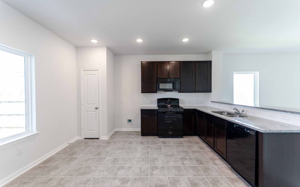 Furnished interior view inside a new home in Morgan Meadows, San Antonio (Image 3).
