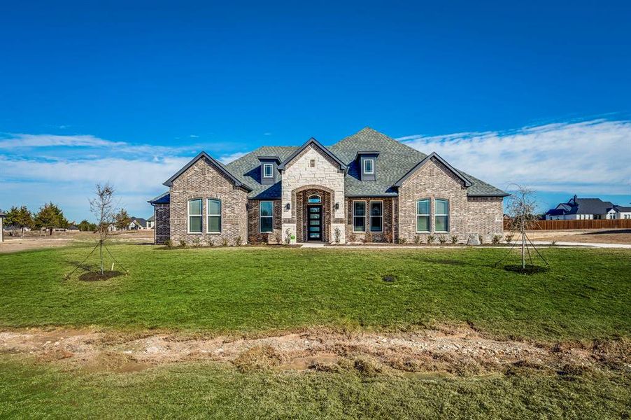 Front exterior of a new home in The Arbors Midlothian, Midlothian, TX, highlighting curb appeal (Image 25).
