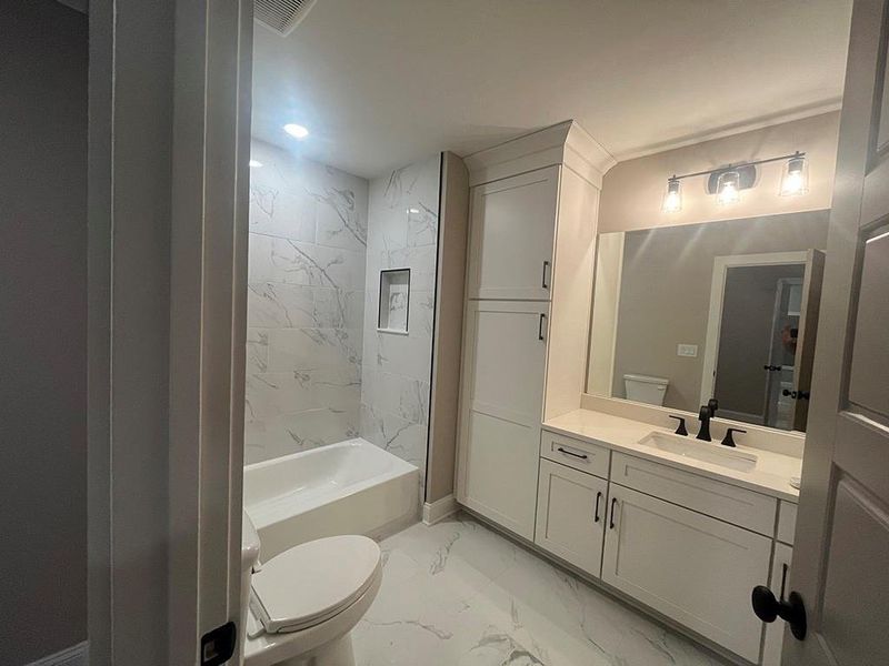 Furnished interior view inside a new home in , White (Image 17).