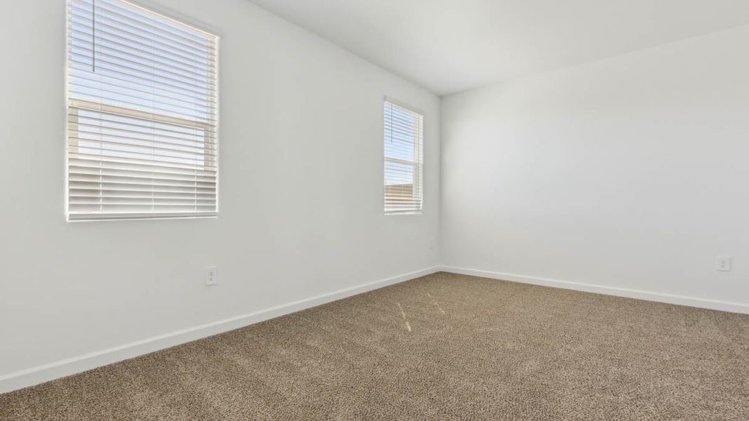 Spacious, unfurnished interior of a new home in Heartland Ranch, Coolidge (Image 14).