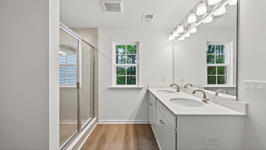 Furnished interior view inside a new home in Creekside at Andrews, Summerville (Image 10). Furnished interior view inside a new home in Creekside at Andrews, Summerville (Image 10).