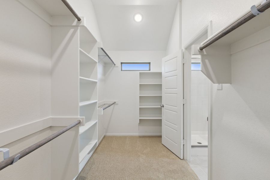 Primary Closet in the Diamond home plan by Trophy Signature Homes – REPRESENTATIVE PHOTO