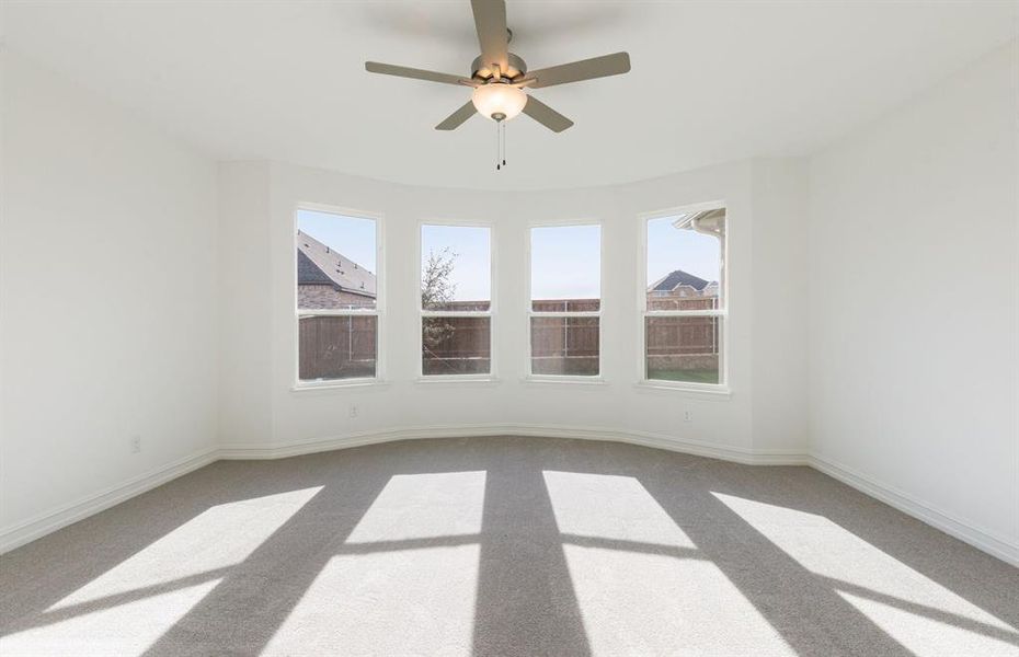 Elegant owner's suite with Bay window *real home pictured