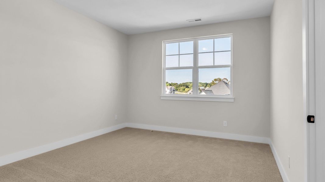 Furnished interior view inside a new home in Richvale Estates, Fairview (Image 37).