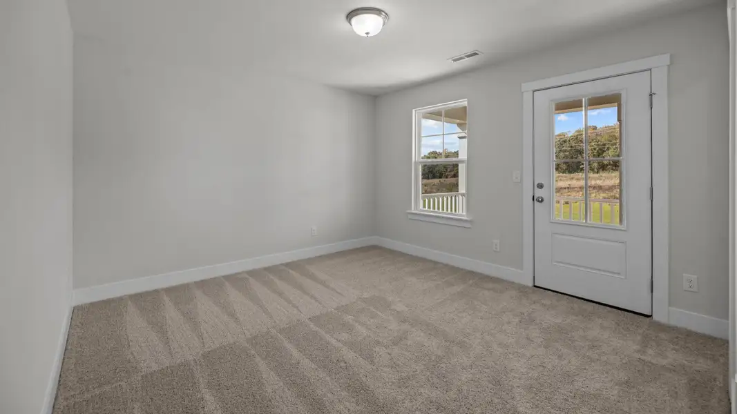 The Burton Plan by DRB Homes in McBride Indian Trail - Bedroom 2 with Balcony