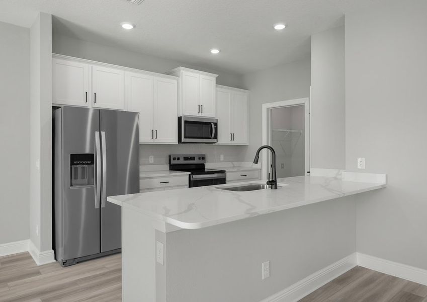 The spacious kitchen is perfect for preparing your family's favorite meals and treats. The spacious kitchen is perfect for preparing your family's favorite meals and treats.