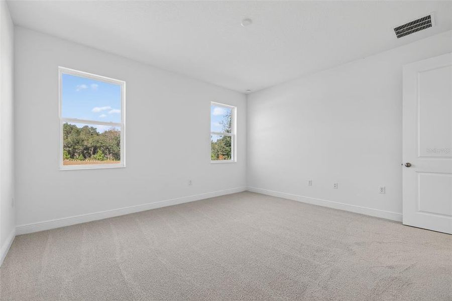 Spacious, unfurnished interior of a new home in Reserve at Hammock Oaks, Lady Lake (Image 22). Spacious, unfurnished interior of a new home in Reserve at Hammock Oaks, Lady Lake (Image 22).