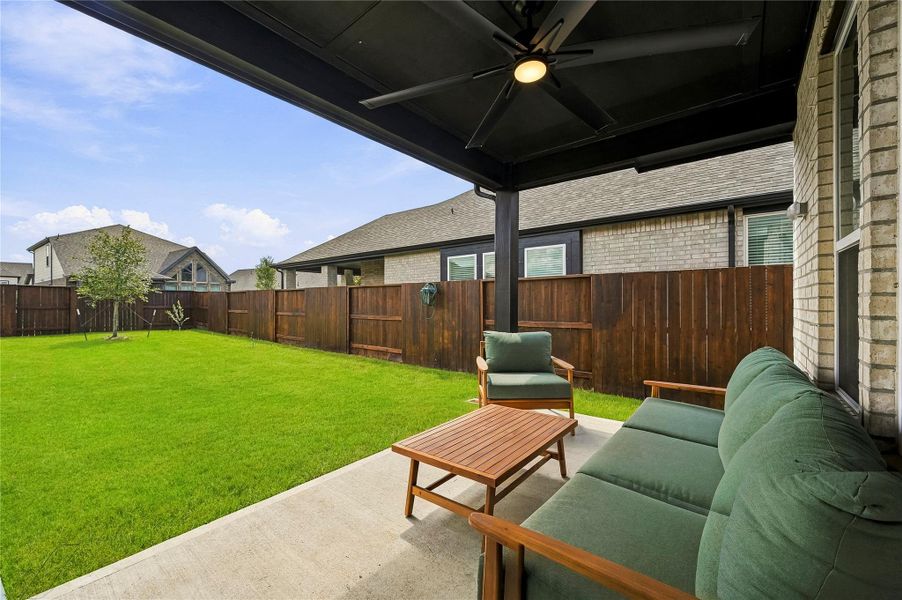 The covered back patio extends the home’s living space outdoors, offering a comfortable setting for morning coffee, evening conversation or relaxed entertaining in any weather. The covered back patio extends the home’s living space outdoors, offering a comfortable setting for morning coffee, evening conversation or relaxed entertaining in any weather.