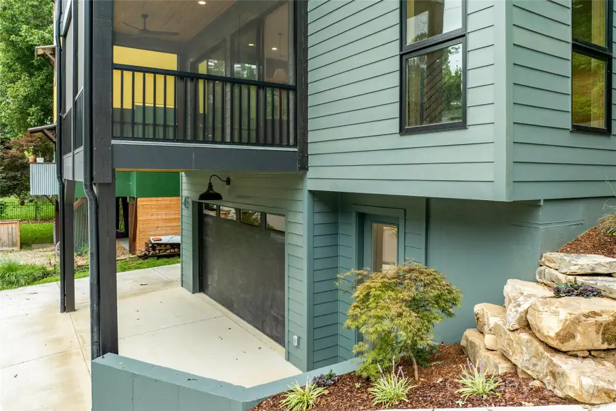 Front exterior of a new home in , Asheville, NC, highlighting curb appeal (Image 1).