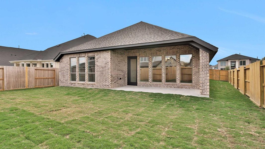 Exterior details and patio area of a home in Candela South 50', Richmond (Image 4).