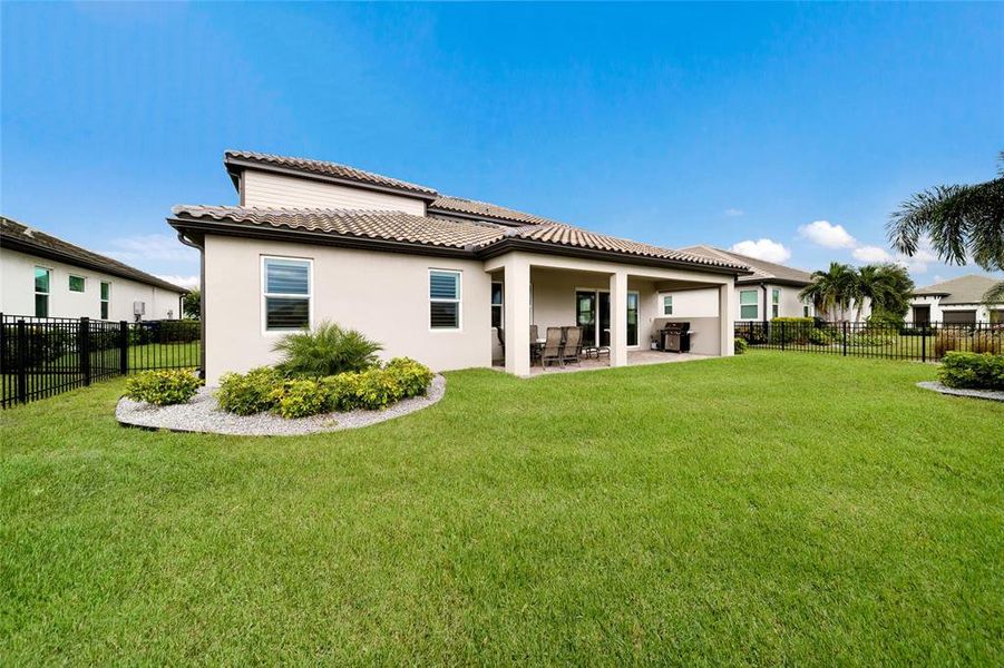 Exterior details and patio area of a home in Sweetwater at Lakewood Ranch, Bradenton (Image 29).