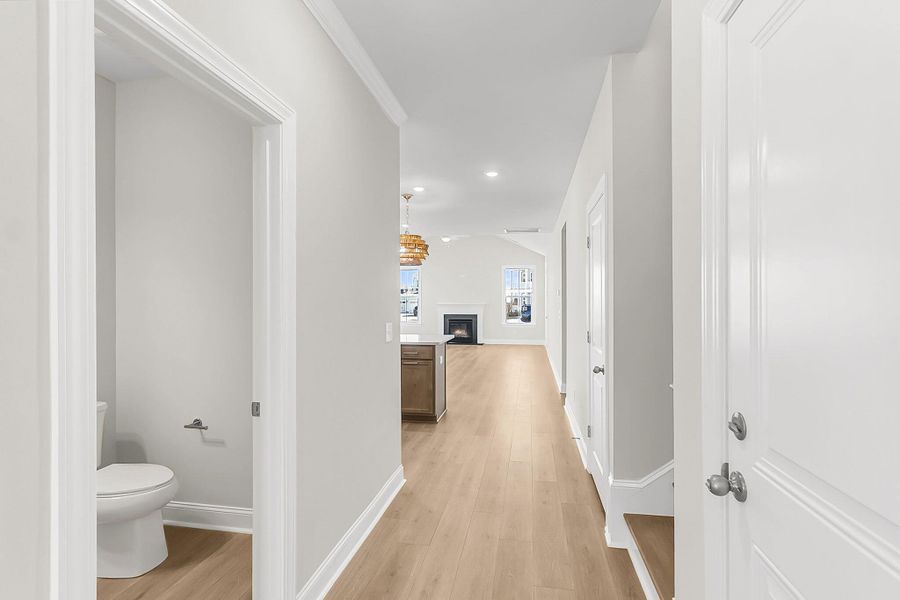 Spacious, unfurnished interior of a new home in Tidewater at Lakes of Cane Bay, Summerville (Image 29).