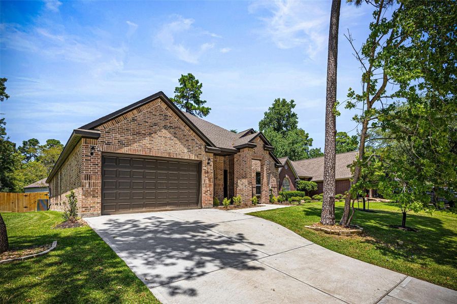 Front exterior of a new home in , Montgomery, TX, highlighting curb appeal (Image 16).