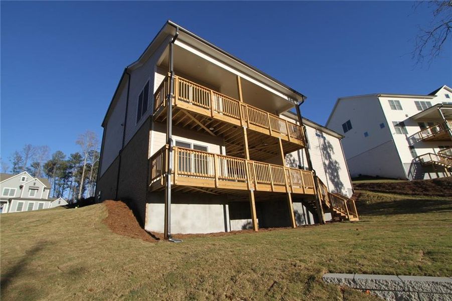 Front exterior of a new home in Ellis, Marietta, GA, highlighting curb appeal (Image 22). Front exterior of a new home in Ellis, Marietta, GA, highlighting curb appeal (Image 22).