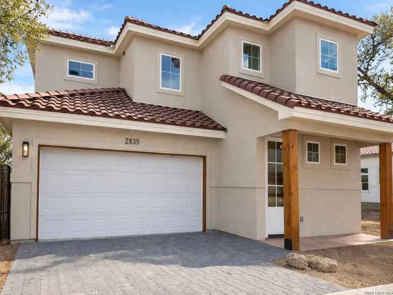 Front exterior of a new home in , San Antonio, TX, highlighting curb appeal (Image 25).