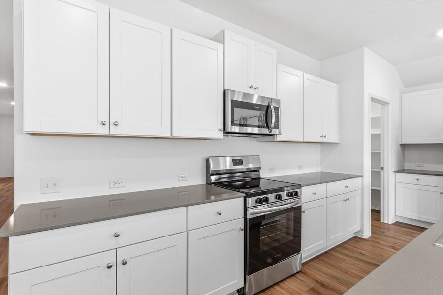 Furnished interior view inside a new home in Thunder Rock: Watermill Collection, Marble Falls (Image 7).
