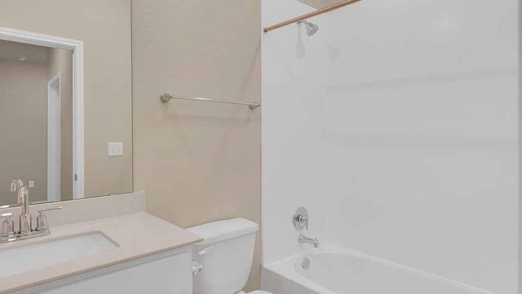 Furnished interior view inside a new home in Bar W Ranch, Leander (Image 6).