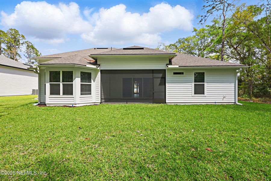 Front exterior of a new home in Goose Creek Estates, Green Cove Springs, FL, highlighting curb appeal (Image 2).